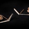 White diamond leave in the center and five leaves below earrings