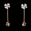 two flowers on the chain with diamond earrings